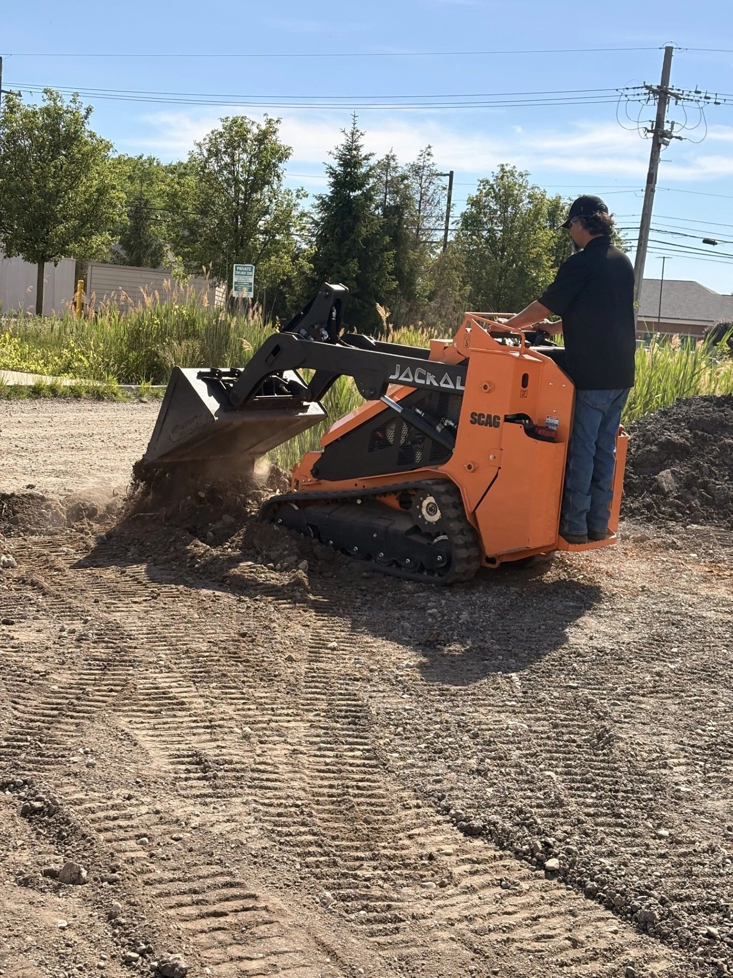 Landscape grading work at a residential property